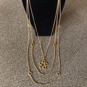 Vintage “Celebrity” 3 strand gold tone necklace.